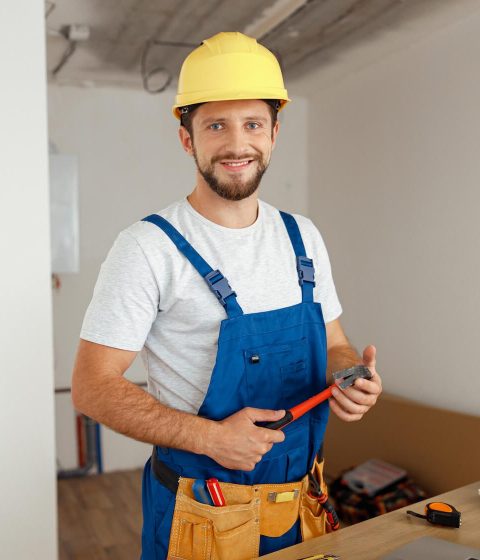 professional-handyman-worker-in-uniform-wearing-to-2022-03-05-19-20-03-utc