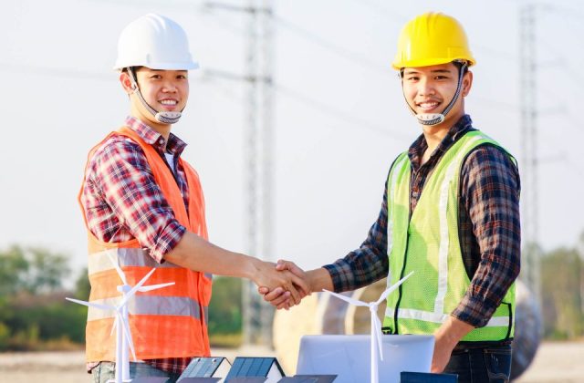 two-engineers-shaking-hands-in-construction-site-a-2022-07-01-06-03-43-utc