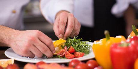 chef-serving-vegetable-salad-2021-08-26-15-57-32-utc