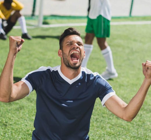 happy-soccer-player-celebrating-goal-during-soccer-2021-08-30-19-50-52-utc