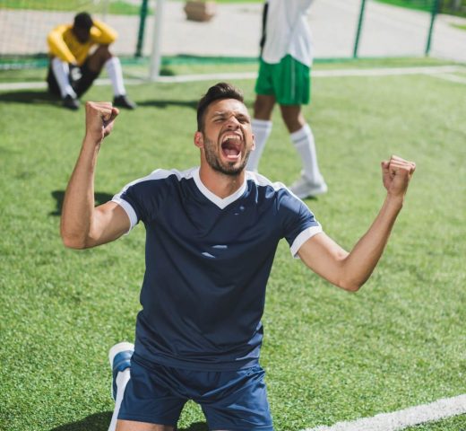happy-soccer-player-celebrating-goal-during-soccer-2021-08-30-19-50-52-utc
