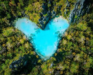 aerial-top-view-of-turquoise-lagoon-shaped-heart-i-2021-08-26-20-17-22-utc