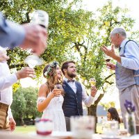 a-senior-man-making-speech-at-wedding-reception-ou-2021-08-26-12-09-15-utc