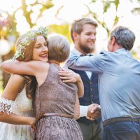 guests-congratulating-bride-and-groom-at-wedding-r-2021-08-26-12-08-54-utc