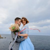 wedding-photo-session-of-a-couple-on-the-seashore-2021-09-01-01-22-10-utc