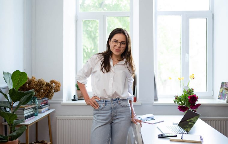 businesswoman-working-on-laptop-computer-sitting-a-2021-12-14-22-52-37-utc